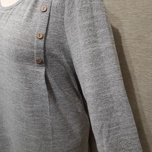 Side view of grey top