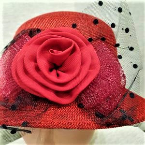 Detailing on red cloche hat
