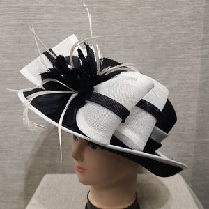 Side view of Formal dress hat in black and white color combination