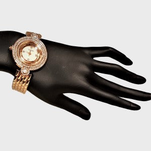 Stone studded wrist watch with white inner dial