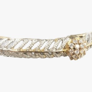 Detailed view of bangle bracelet with stones