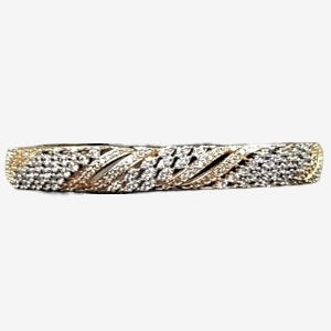 Detailed view of bangle style bracelet with stones