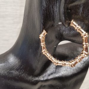 Push back post of bold gold frame open hoop earrings