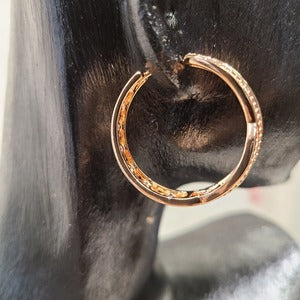 Latch back of Medium sized gold hoop earrings