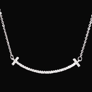 Delicate necklace with smiley pendant