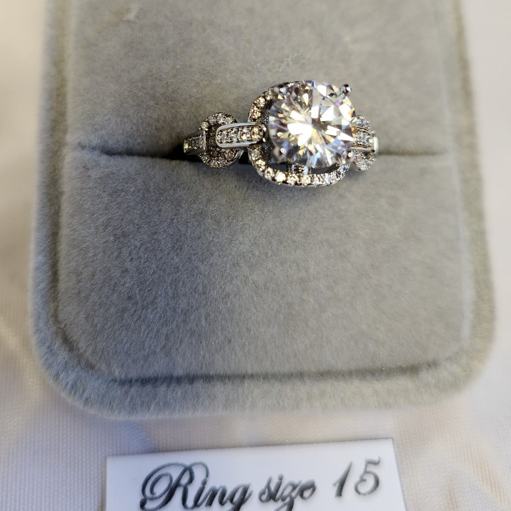 Detailed view of Square face stone studded silver color ring