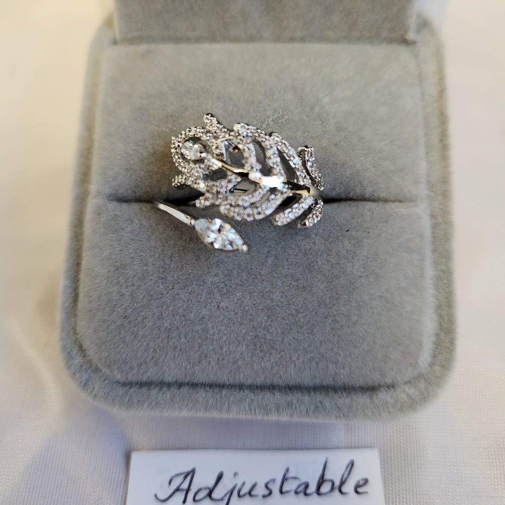 Detailed view of nature inspired feather shaped ring