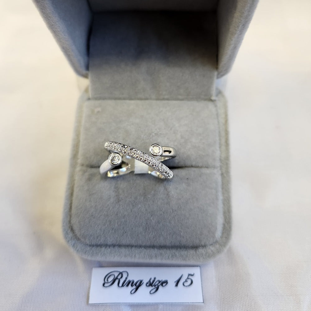 Angled multi strand stone studded ring