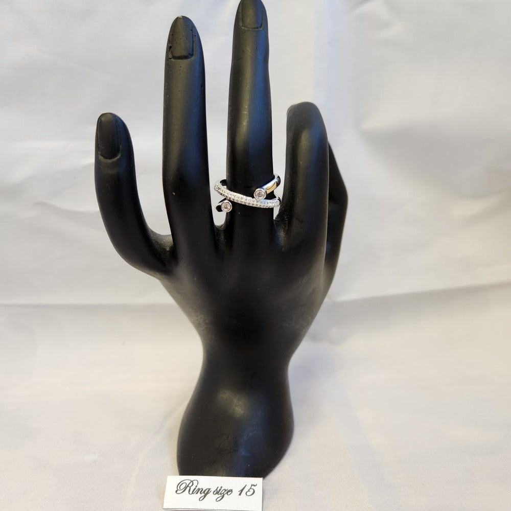 Angled multi strand stone studded ring displayed on a mannequin stand
