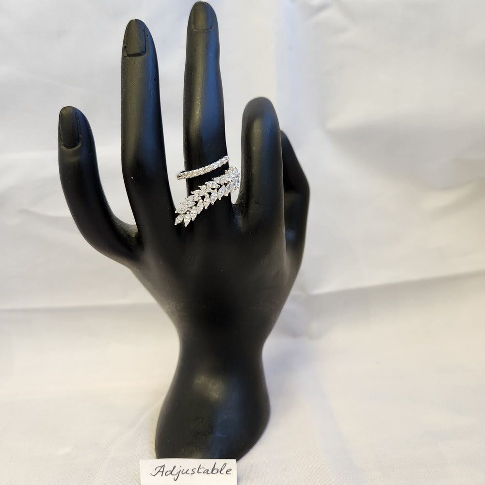 Adjustable nature inspired silver stone studded ring on a mannequin stand