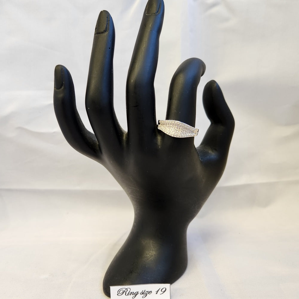 Six row stone set silver colored ring displayed on a mannequin stand