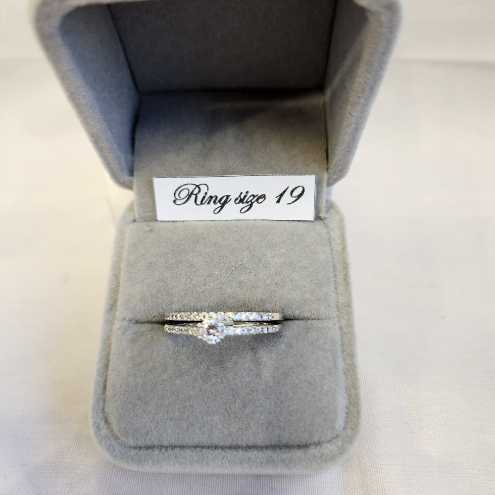 Detailed view of Silver color stackable ring set with delicate set stones