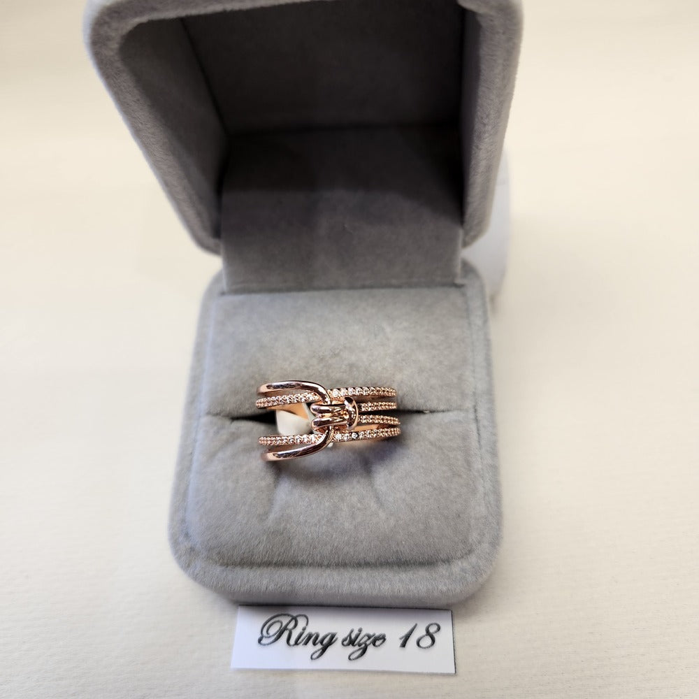 Multiple strand modern rose gold colored ring