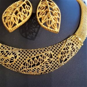 Earrings and necklace of jewelry set