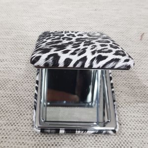 Open black and white animal print pocket mirror