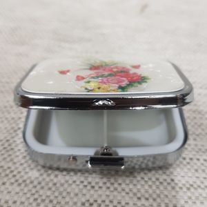 Partitioned metallic pill box