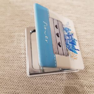 Open square pocket mirror with floral design