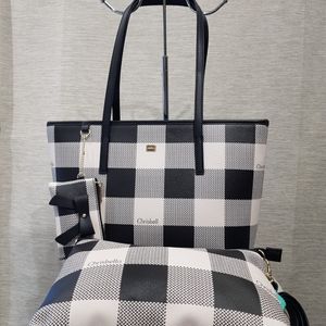 Front view of black & white checkered handbag