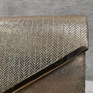 Gold trim detail of party purse