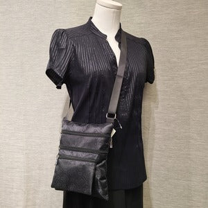 Full view of Black self print side bag