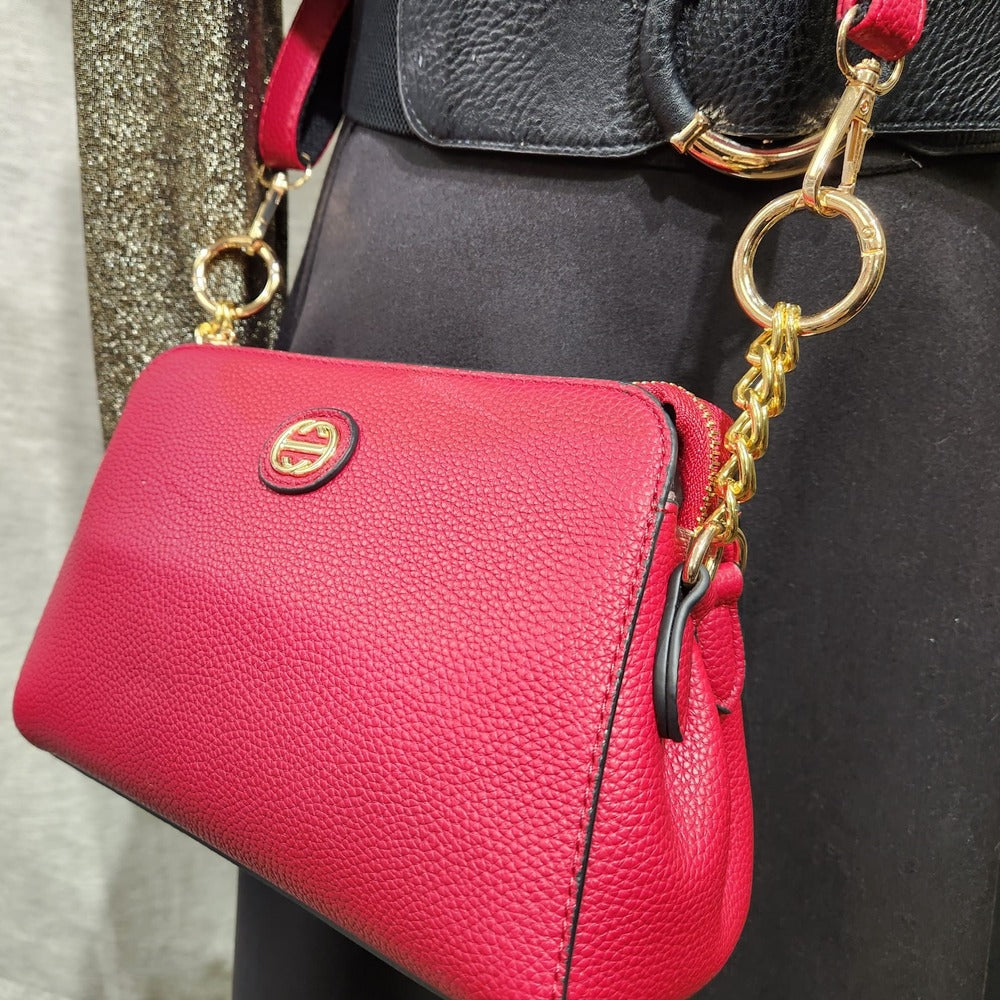 Another view of red side bag with two straps