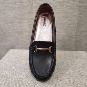 Front view of black color shoes for women with small platform heel