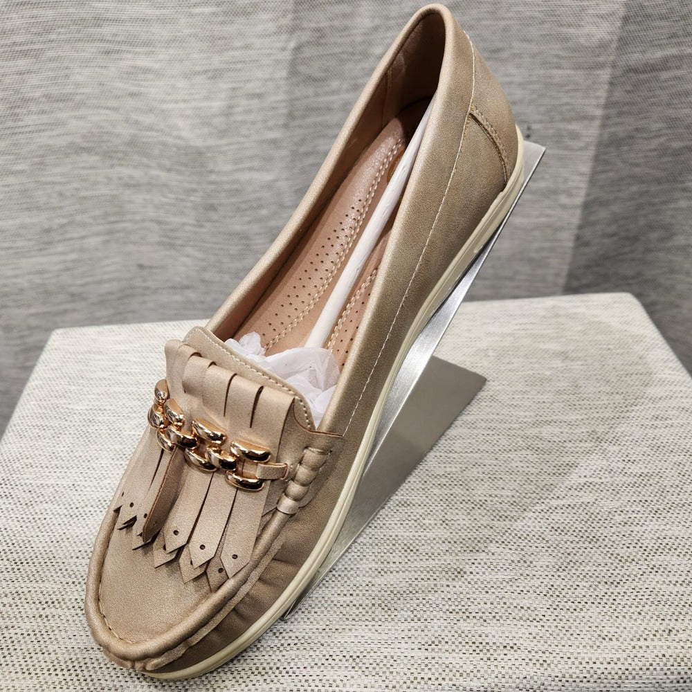Another view of light gold color flat shoes