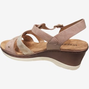 Side view of dusty pink sandals with gold studs