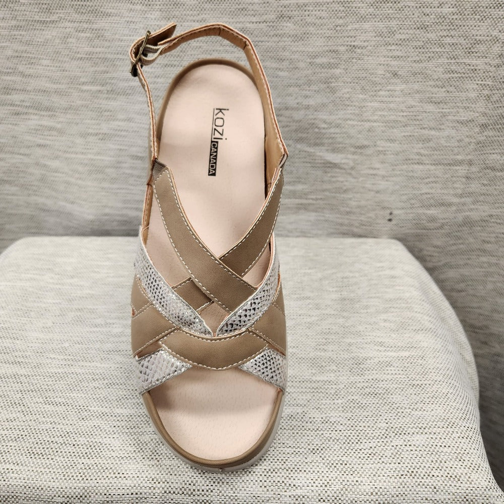 Front view of orthopedic summer sandal with taupe and shimmery straps