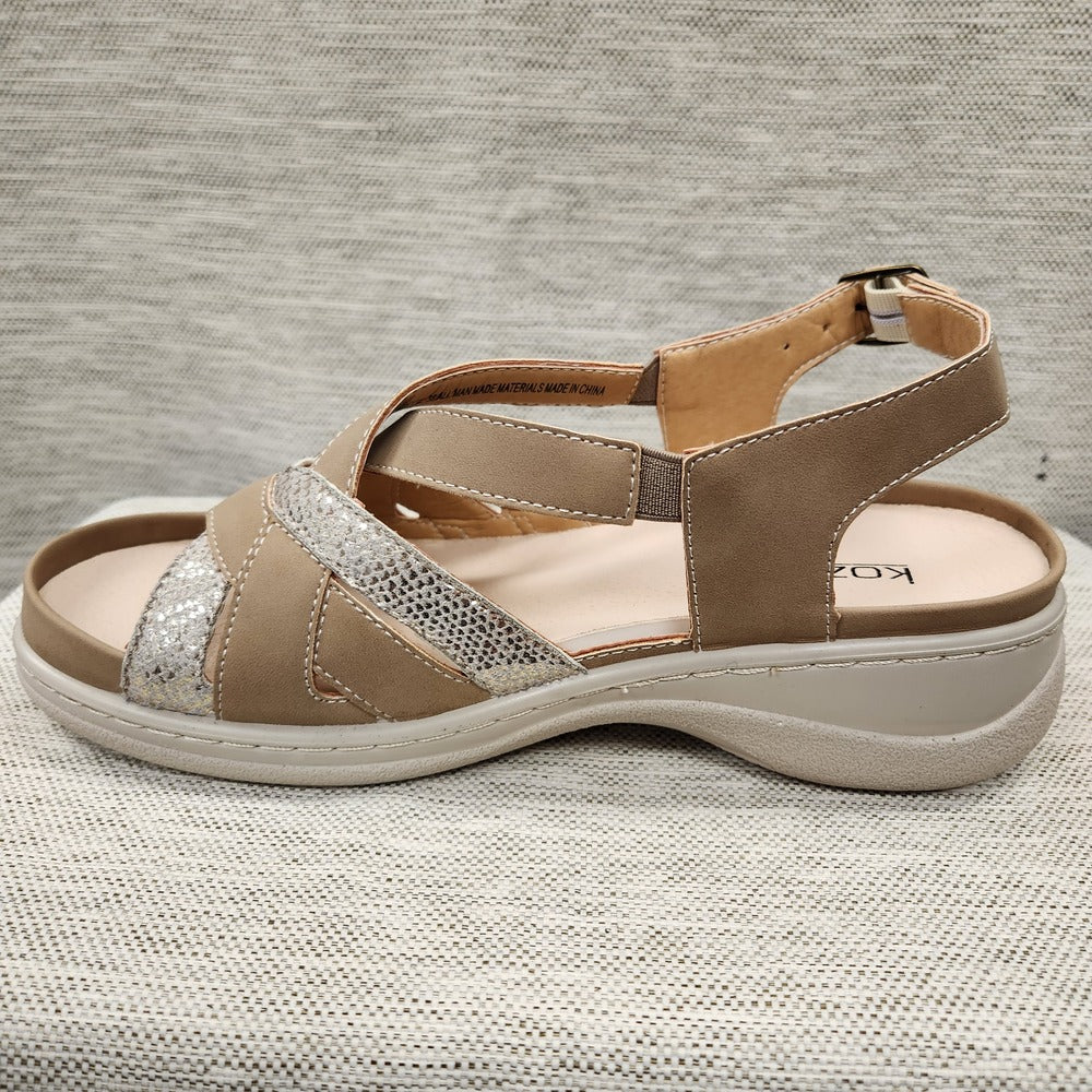 Another side view of orthopedic summer sandal with taupe and shimmery straps