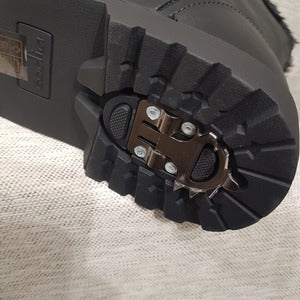 Closer view of flip down spike on heel