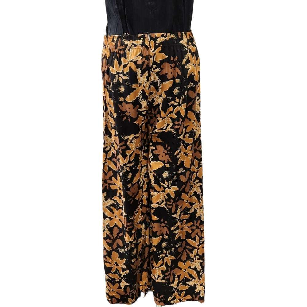 Front view of culottes with black background and floral print