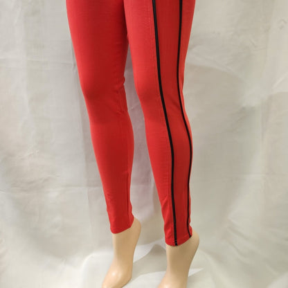 Red leggings with black piping detail on the side