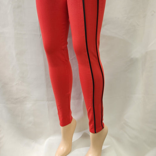Red leggings with black piping detail on the side