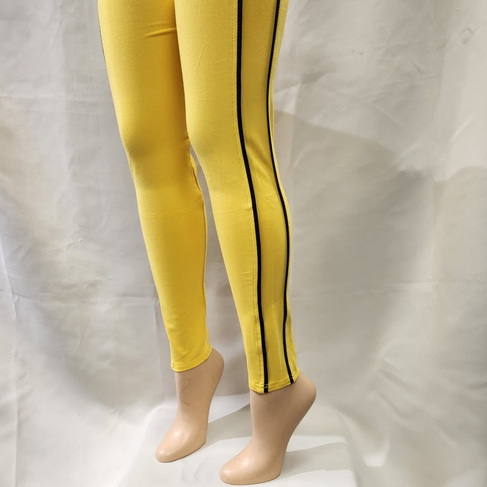 Yellow leggings with black piping detail on the side