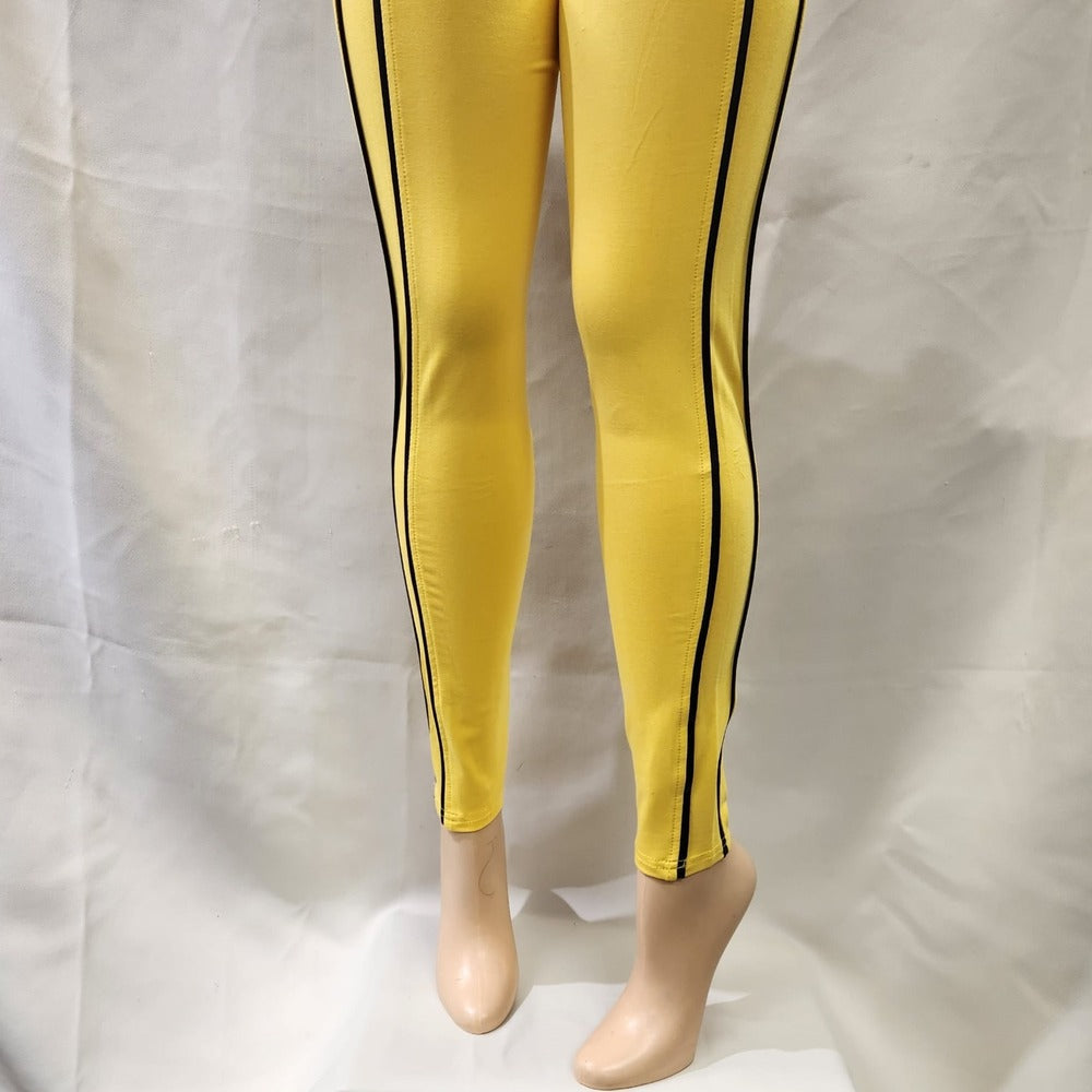 Alternative view of yellow leggings with black piping 