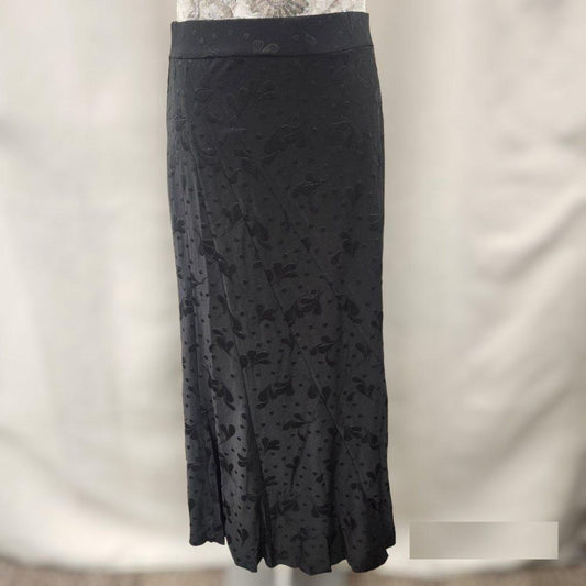 Black skirt with panels and flared hemline