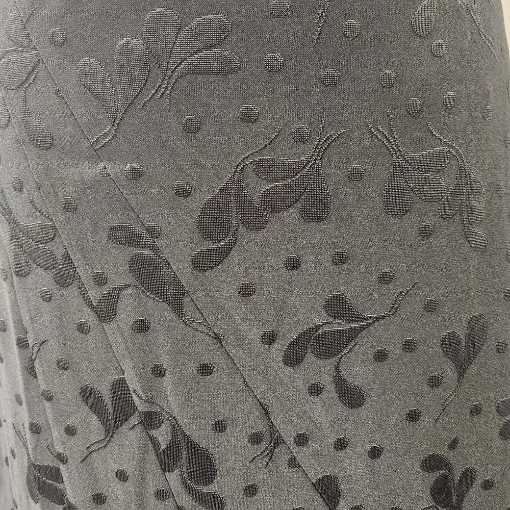 Another detailed view of the embossed print black flary skirt