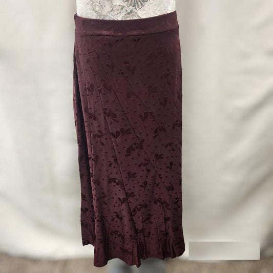 Burgundy skirt with panels and flared hemline
