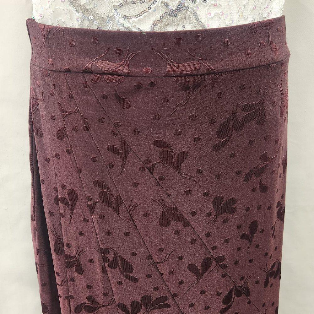 Another detailed view of burgundy flary skirt
