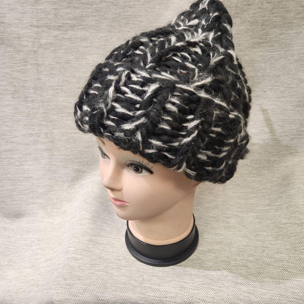 Winter beanie in black and white multicolored yarn