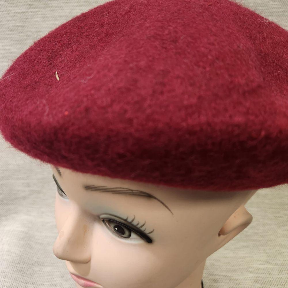 Closer view of French beret cap in burgundy