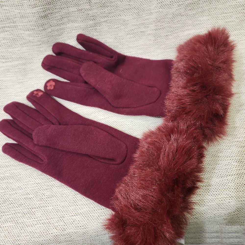 Burgundy colored winter gloves with fur trim