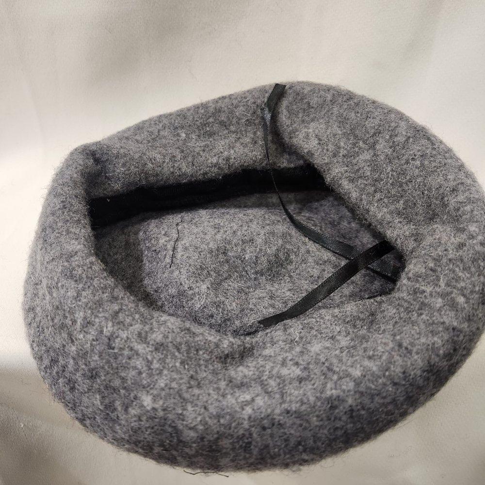 Inside view of French beret cap in dark grey
