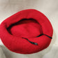Inside of French beret cap in red