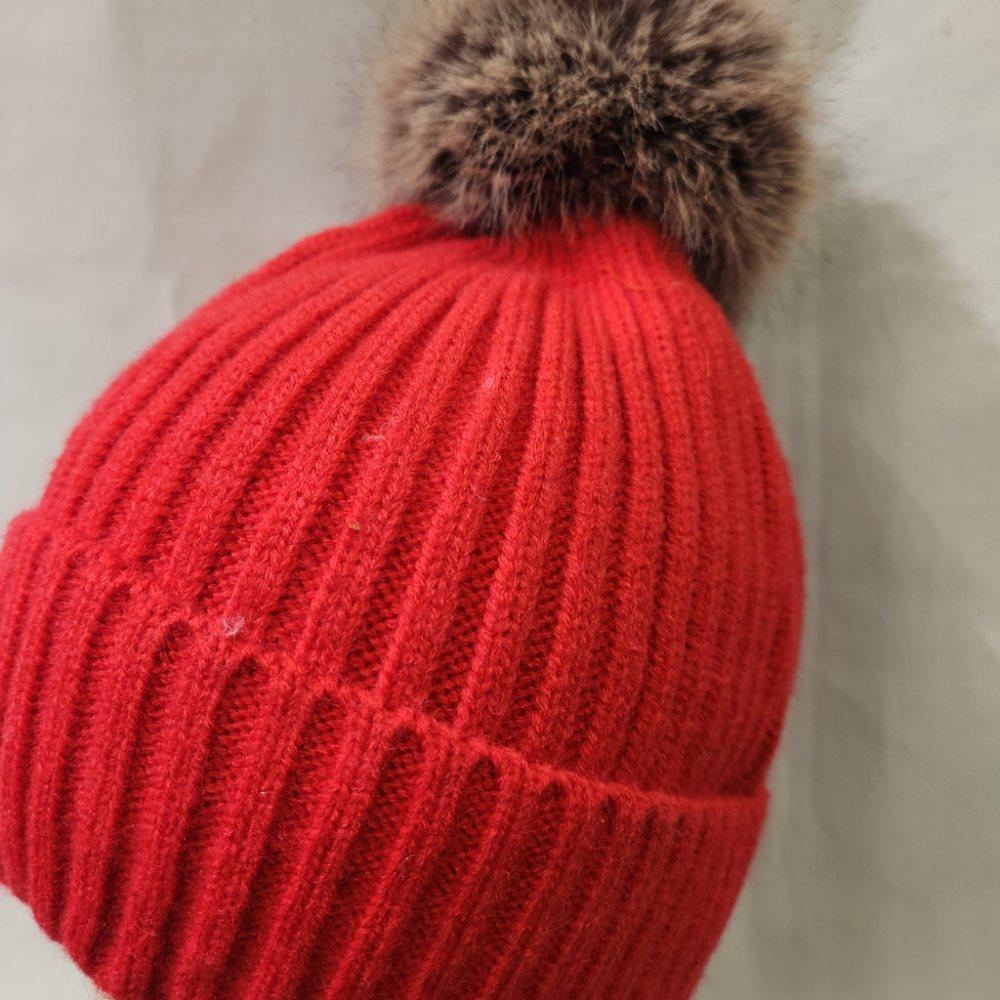 Detailed view of red winter beanie