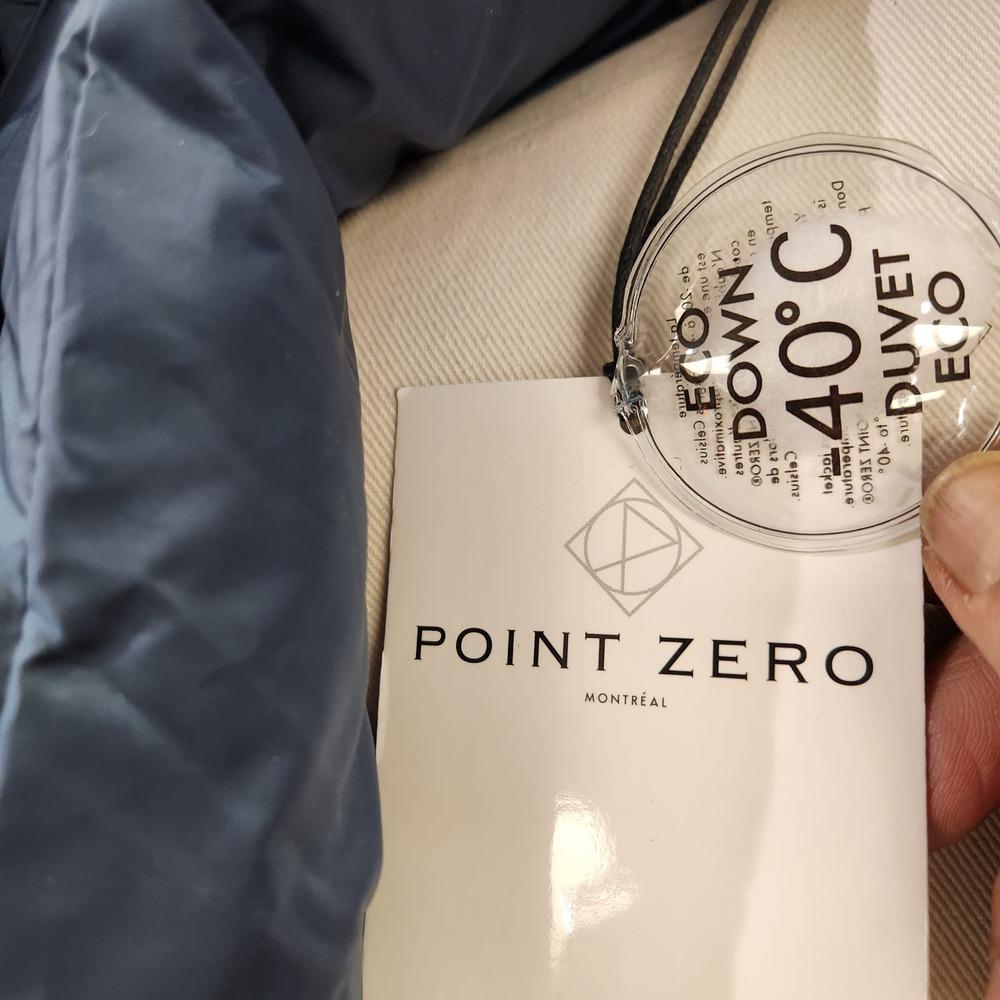 Eco-down tag on navy puffer jacket