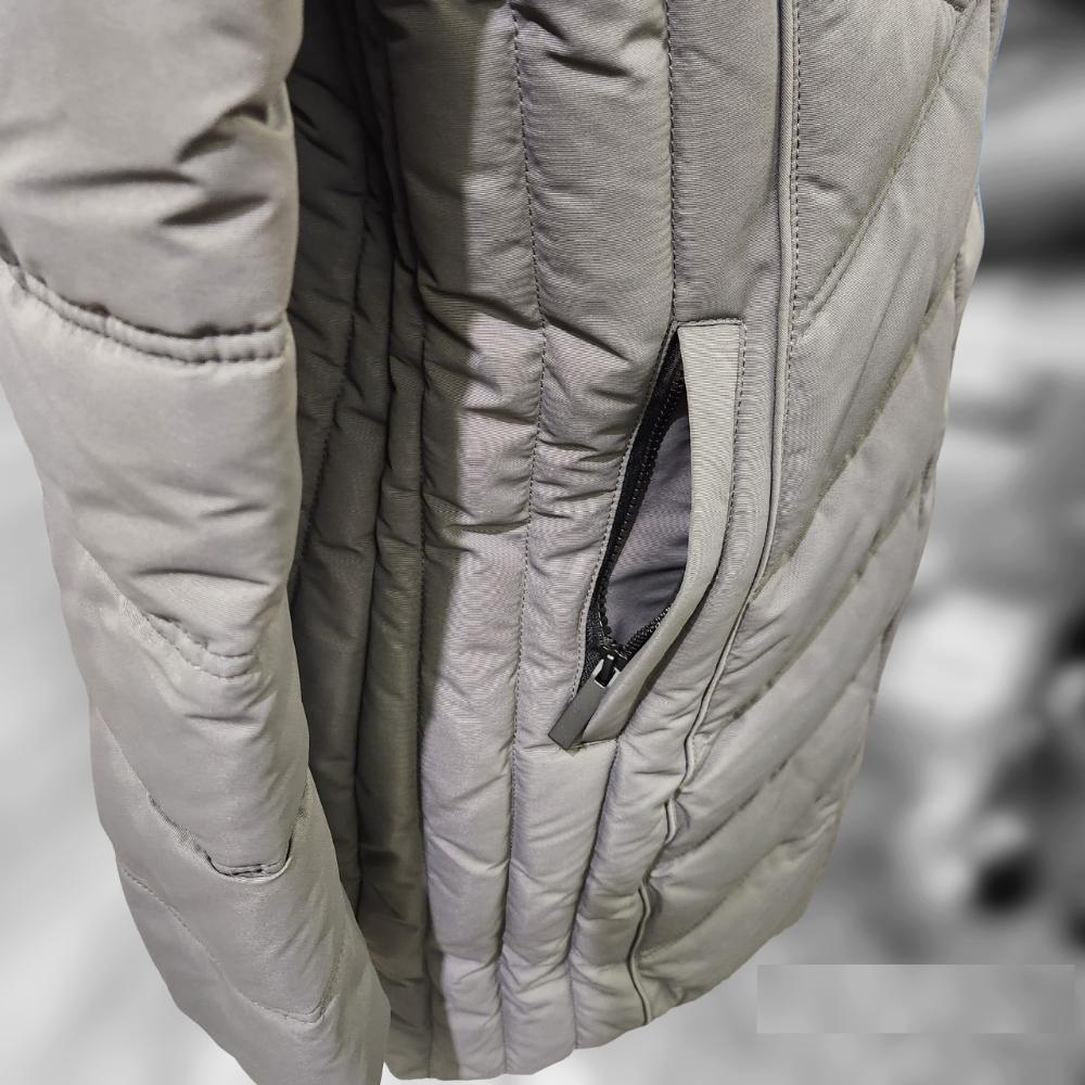 Zipped side pocket of graphite winter jacket