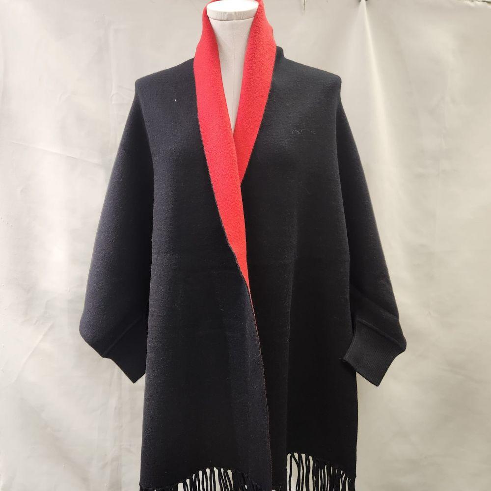 Reversible cape with sleeves in red and black  with black side up