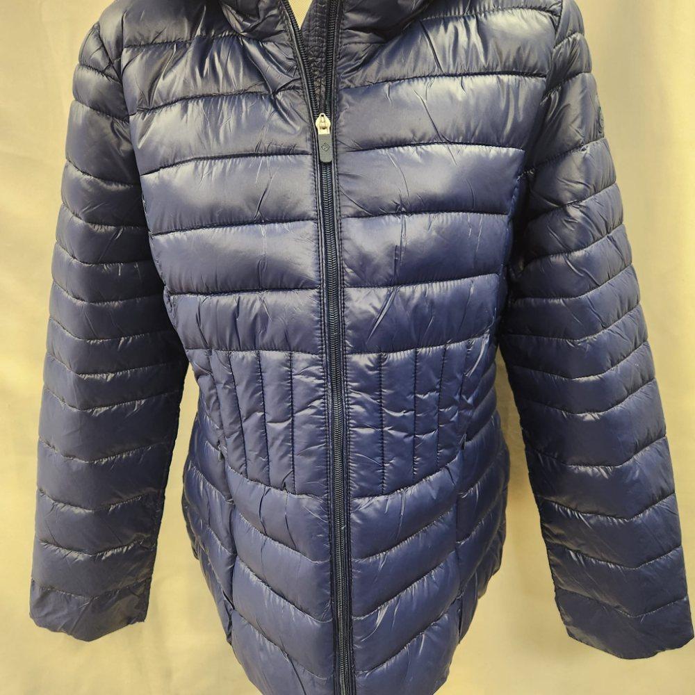 Partial front view of blue ultra light weight jacket